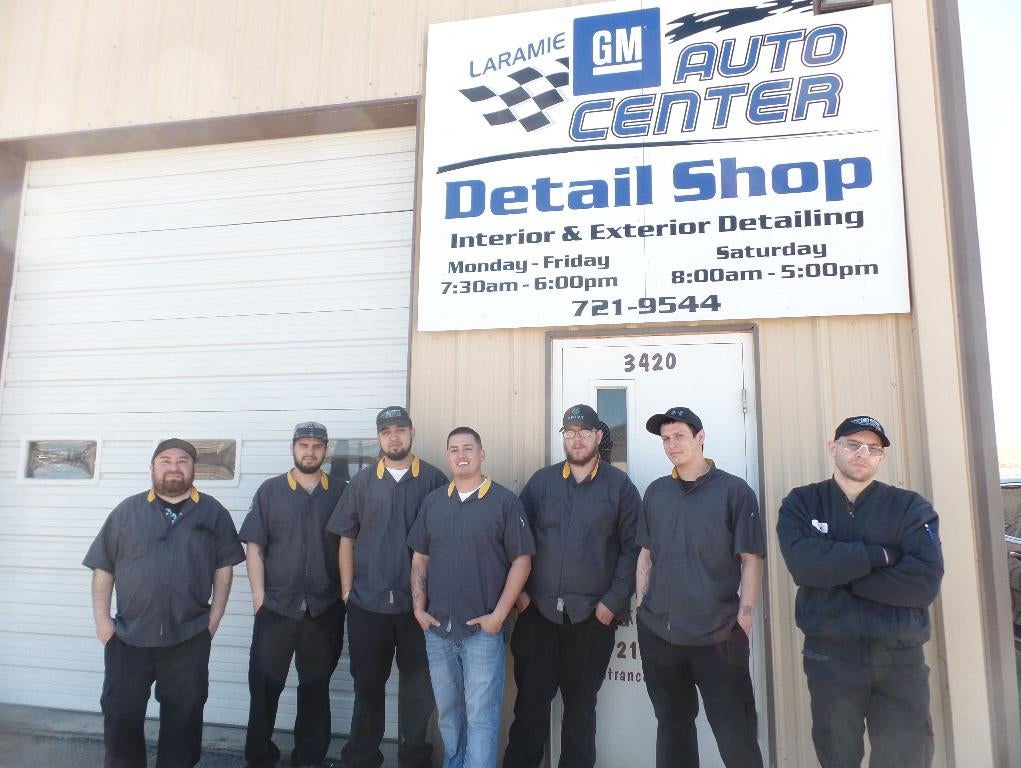 staff standing in front of bodyshop